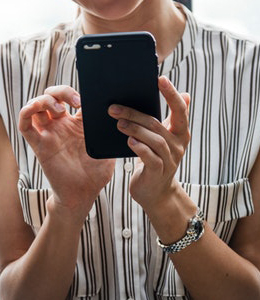 Student Looking at Cellphone